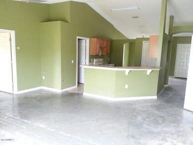 Greatroom to kitchen