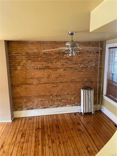 Exposed brick wall in Dining area