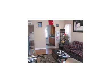 Living Room. Refinished hardwood floors and fresh 