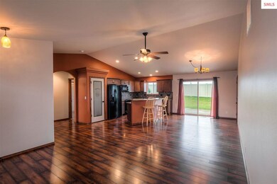 New paint, laminate wood floors, ceiling fans, and