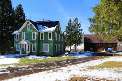 Metal roof and replacement windows, paved driveway