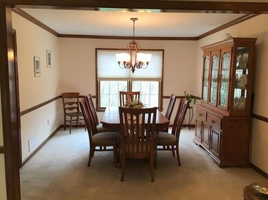 Chair rail and crown moldings continue in to the d