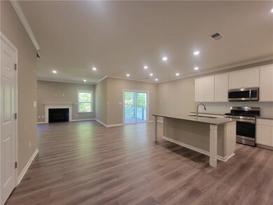 open family room, kitchen & dining area