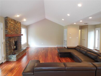 ANOTHER VIEW OF THE VAULTED GREAT ROOM WITH LOTS O