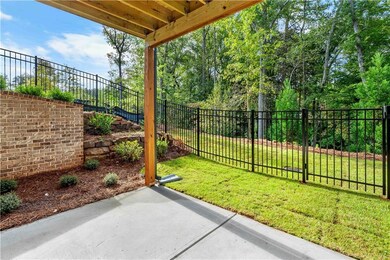 Fenced backyard featuring a patio