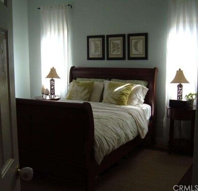 Well lit cozy master bedroom