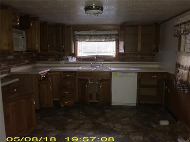 KITCHEN WITH AMPLE CABINETRY & COUNTER SPACE