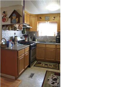 UPDATED KITCHEN WITH NEW CABINETS, COUNTER TOP, BA