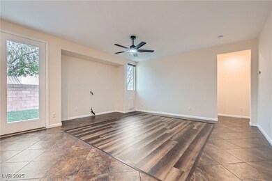 Unfurnished living room with a ceiling fan, basebo
