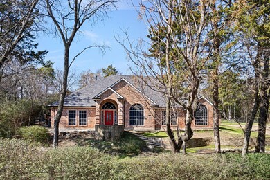 View of front facade featuring brick siding and a 