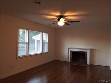 Another view of the living room with a fireplace.  Great for those chilly nights!