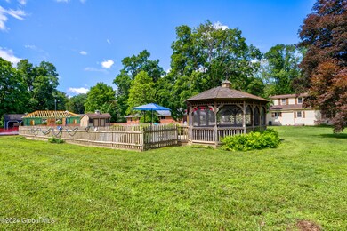 Exterior pool fence with gazebo