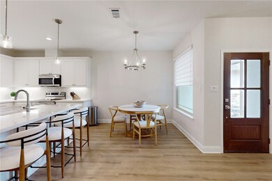 Dining area featuring light hardwood / wood-style