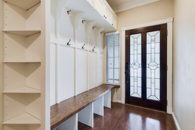 The Entryway Features Built ins for your backpacks, shoes, coats, purse, bags, and more!