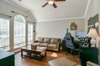 The office is located at the front of the home. It could also be used as a formal living room.