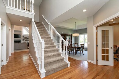 Dramatic 2 story entrance with hardwood floors