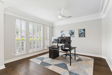 Bathed in natural light, this versatile room works