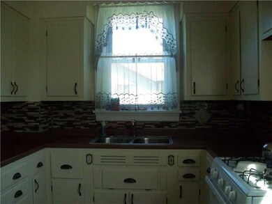 Kitchen. .Glass mosaic tile back splach, a touch o