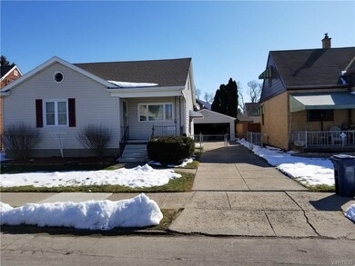Front with with driveway to detached 2.5 car garag