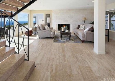 Living room with ocean views, huge windows and gor