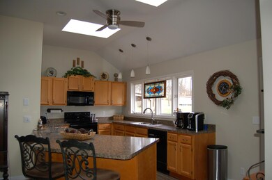 Soaring Kitchen Ceiling with Sky Lights 