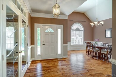 Foyer featuring hickory solid hand scrapped hardwo