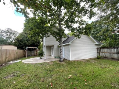 Back Patio & Fenced in Back yard