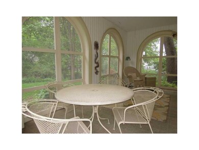Screen Porch. French doors lead into the living ro