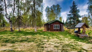Quaint Cabin by the River
