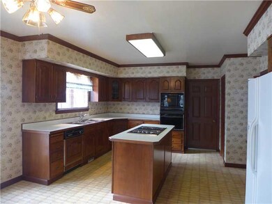 Kitchen. Large Eat in Kitchen with cherry cabinets