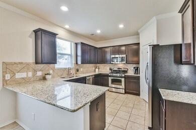 Your kitchen has beautiful granite counters with tons of space and stainless steel appliances.