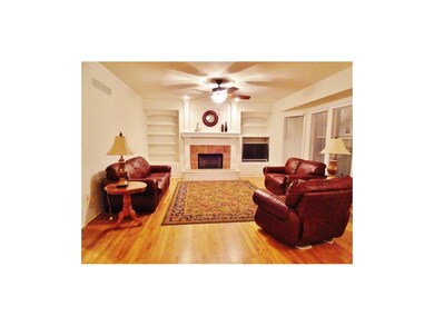 GREAT ROOM WITH HARDWOODS, FIREPLACE, BUILT IN BOO