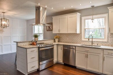 The kitchen has stainless steel appliances and sub