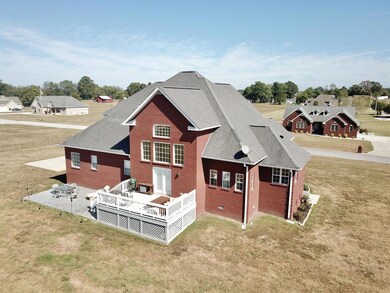 This aerial view shows the beautiful deck and patio.