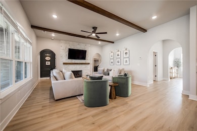 Custom arched moldings throughout the main floor.
