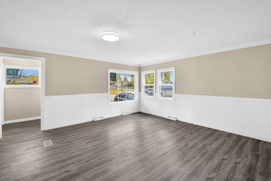 #5 - Living Room & Entry Way from Kitchen.jpg