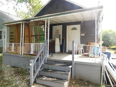 Property entrance featuring a porch