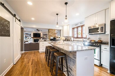 Kitchen flows into the fabulous family room, with 