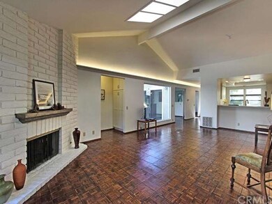 View of living room from backyard/patio slider.  B