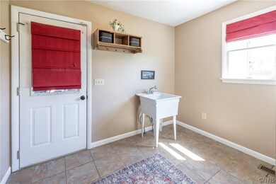 Mud room door to garage with pantry and closet