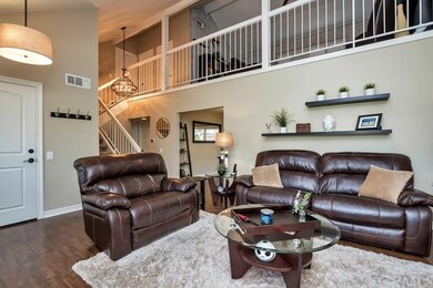 Designer Light fixtures throughout give this home 
