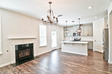 Gas fireplace & upgraded lighting.