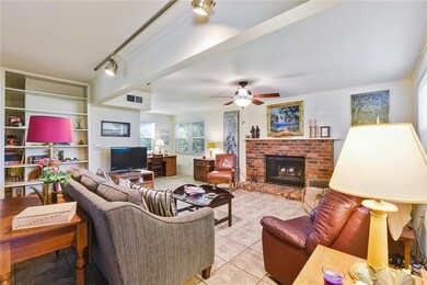 Den with gas fireplace