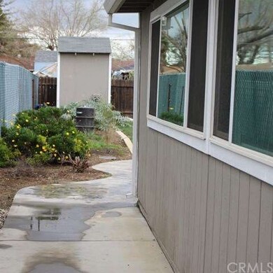 Gate and walk way on west side of property