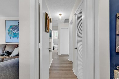 Corridor featuring light hardwood / wood-style flo