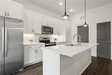 Kitchen featuring Restoration Hardware Pendant lig