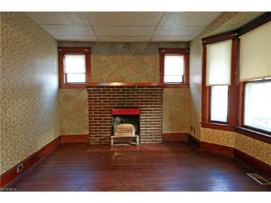 Gas fireplace insert in the living room.