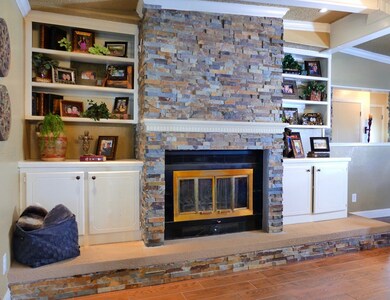 Newly remodeled Fireplace. Built in shelves.