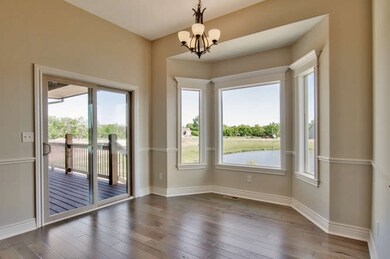 Dining Area Overlooks Lake With Fountain