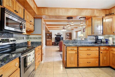 Kitchen into Family Room from Breakfast Area.  Lot